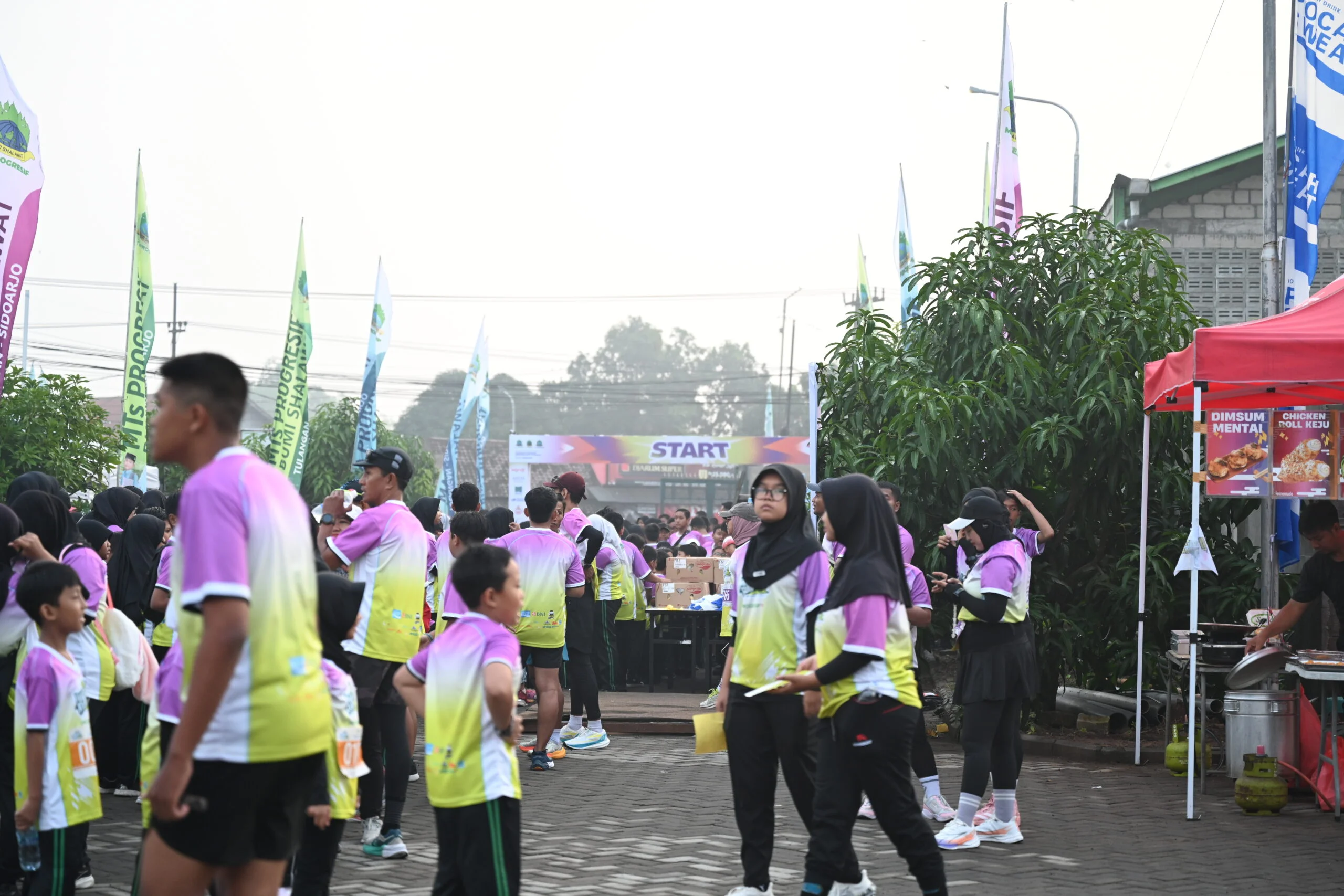 Pelari bersiap di garis start